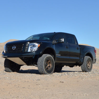 Nissan Titan Dirt King long travel kit in desert