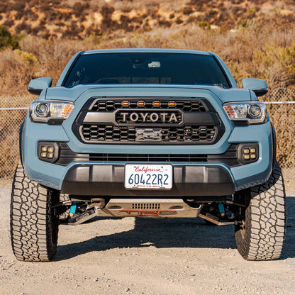 Toyota Tacoma with Dirt King +2 inch long travel kit — front exterior