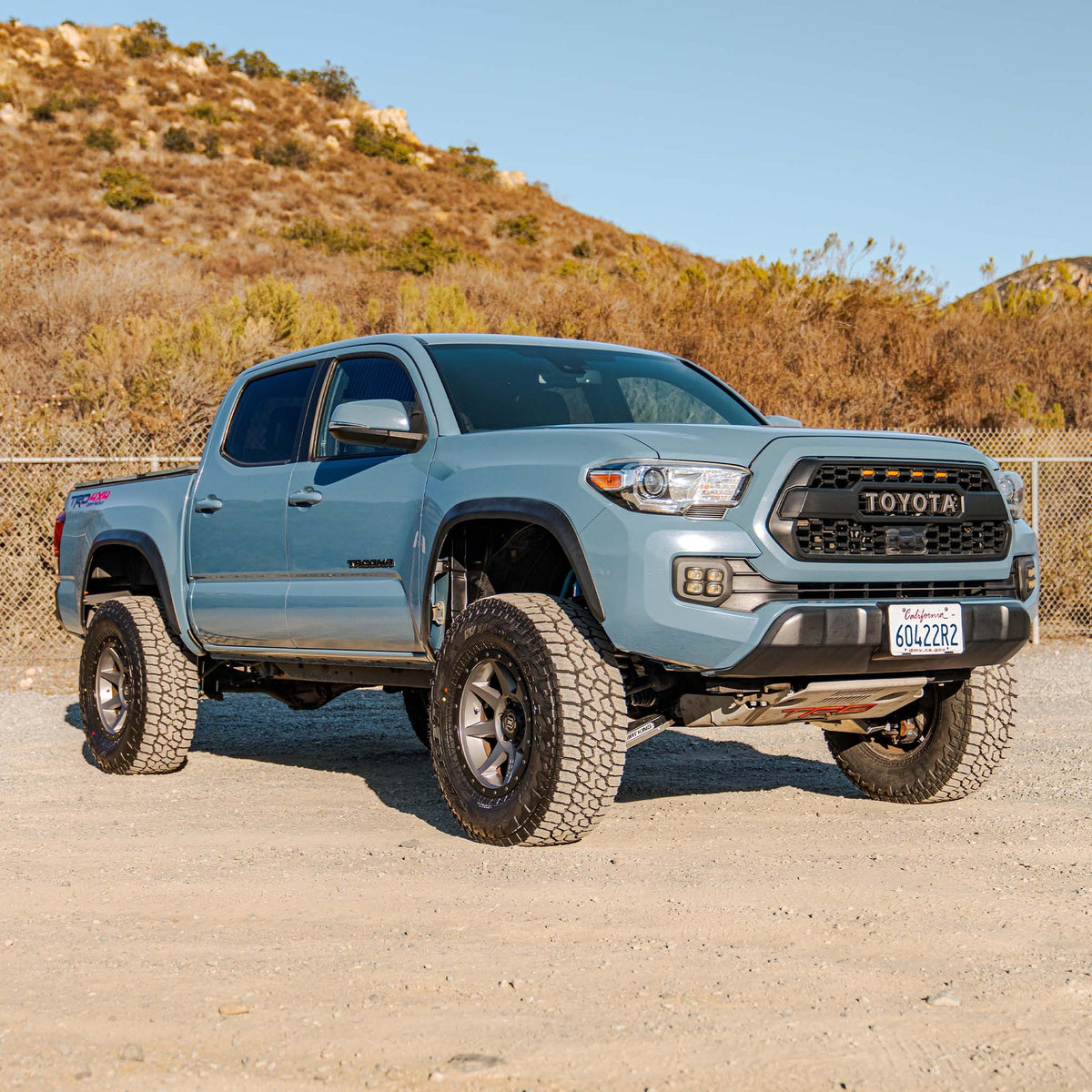 Toyota Tacoma with Dirt King +2 inch long travel kit — exterior
