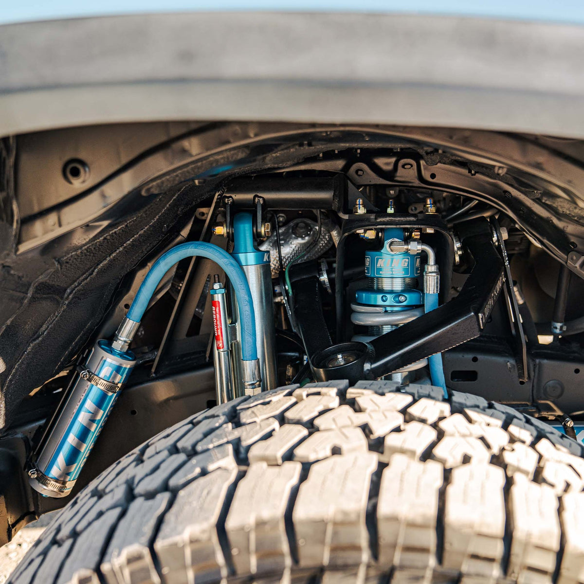 Dirt King Tacoma +2 inch long travel kit installed — second view