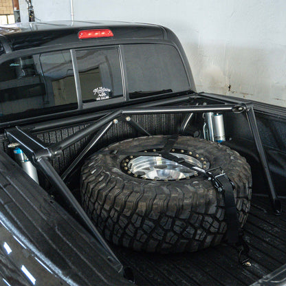 Dirt King prefab bed cage installed on a Toyota Tacoma