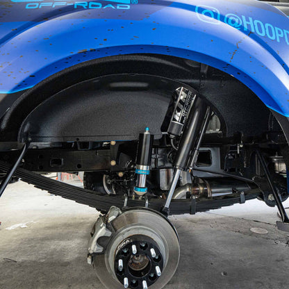 Dirt King bolt-on bump stop kit installed on Ford F-150 – side view