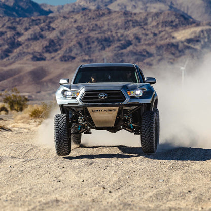Toyota Tacoma with Dirt King long travel kit — action view 3