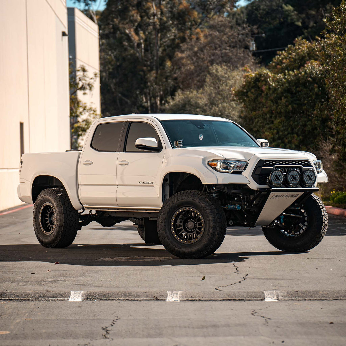 Toyota Tacoma with Dirt King long travel kit — exterior view