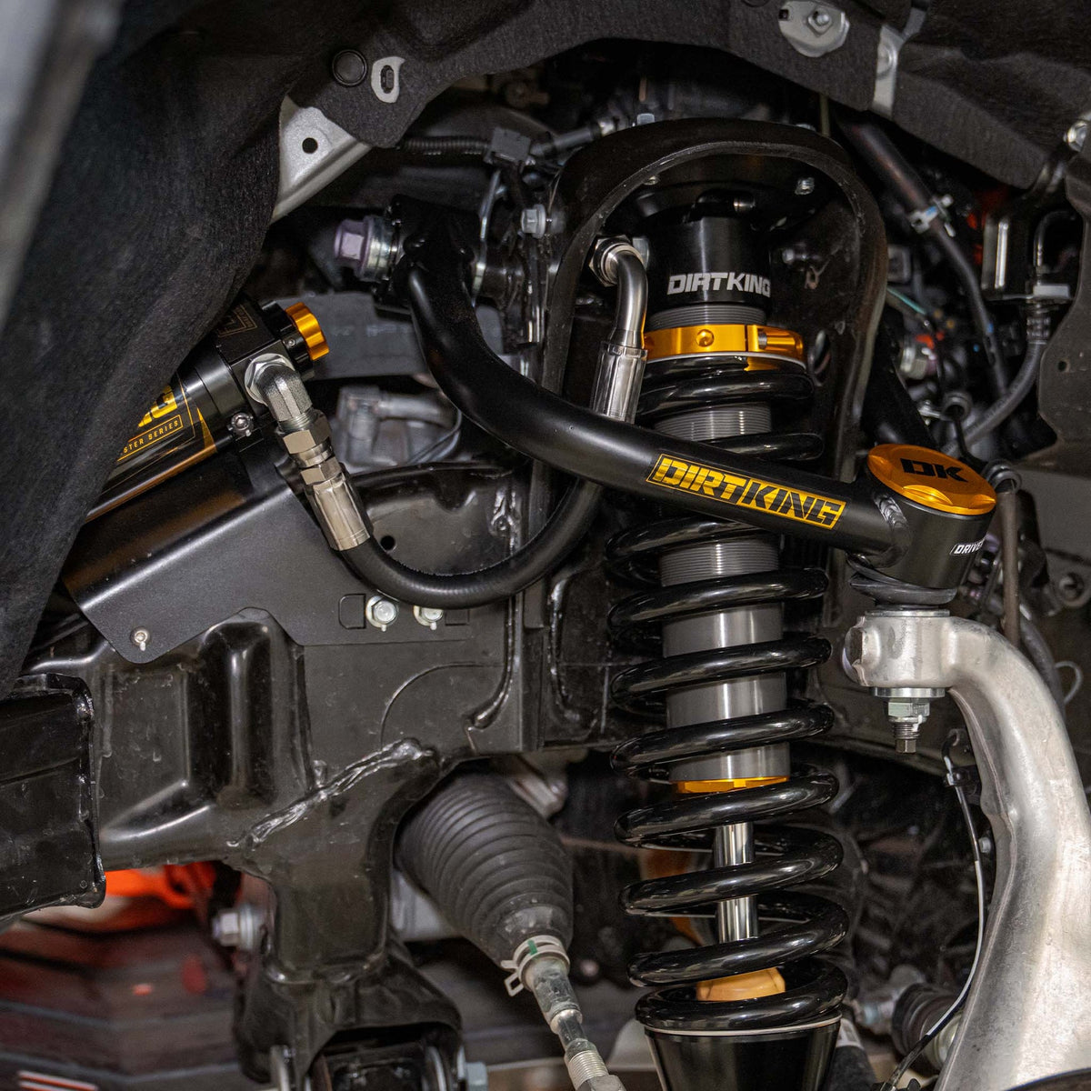 Dirt King 2.5 DCA remote-reservoir coilover installed