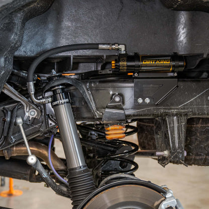 Dirt King DCA rear shock reservoir installed on Toyota Tacoma