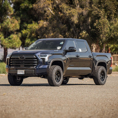 Toyota Tundra equipped with Dirt King upper control arms — front view