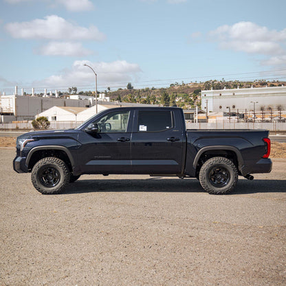 Toyota Tundra equipped with Dirt King upper control arms — side view