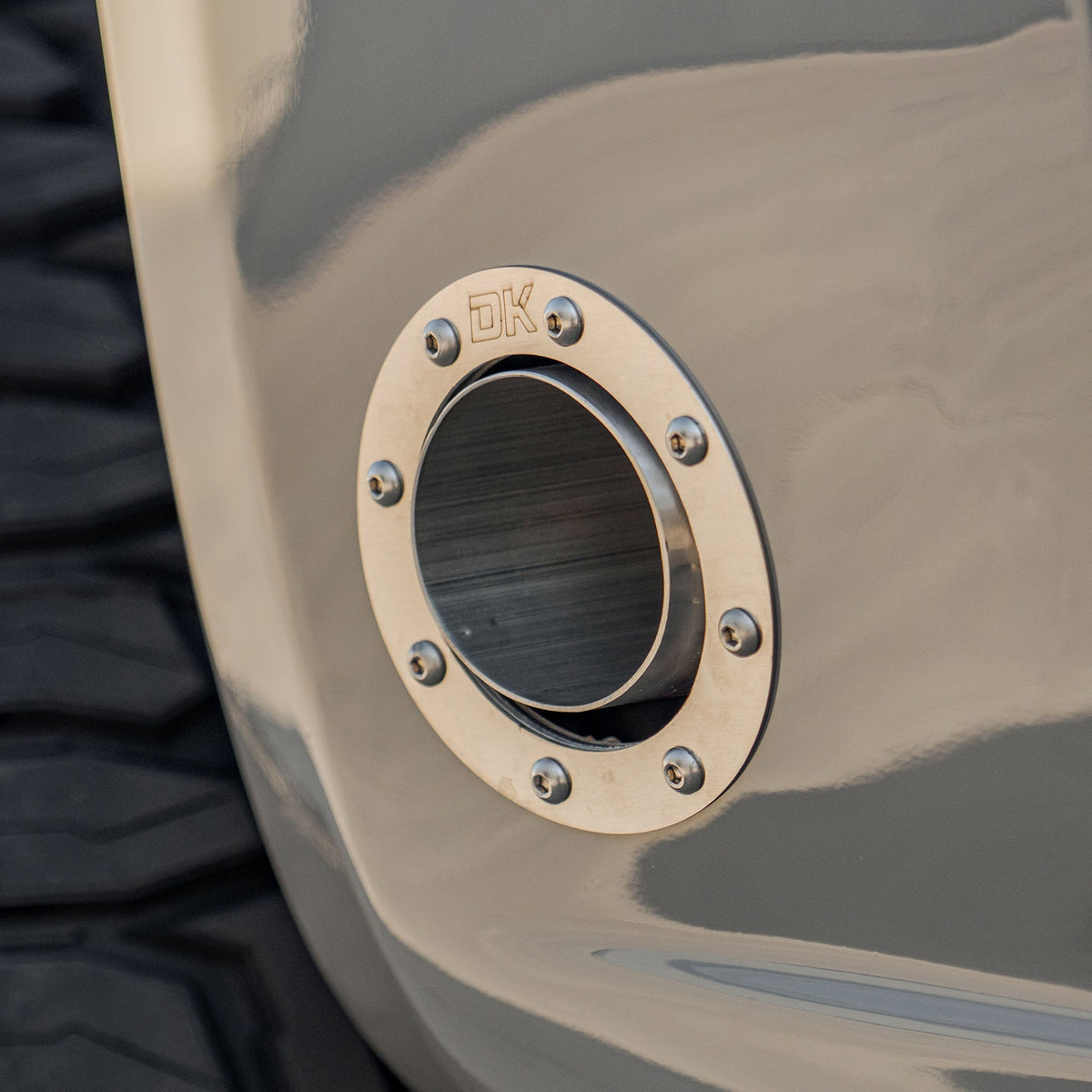 Dirt King Side Exit Exhaust Bezels installed — close view