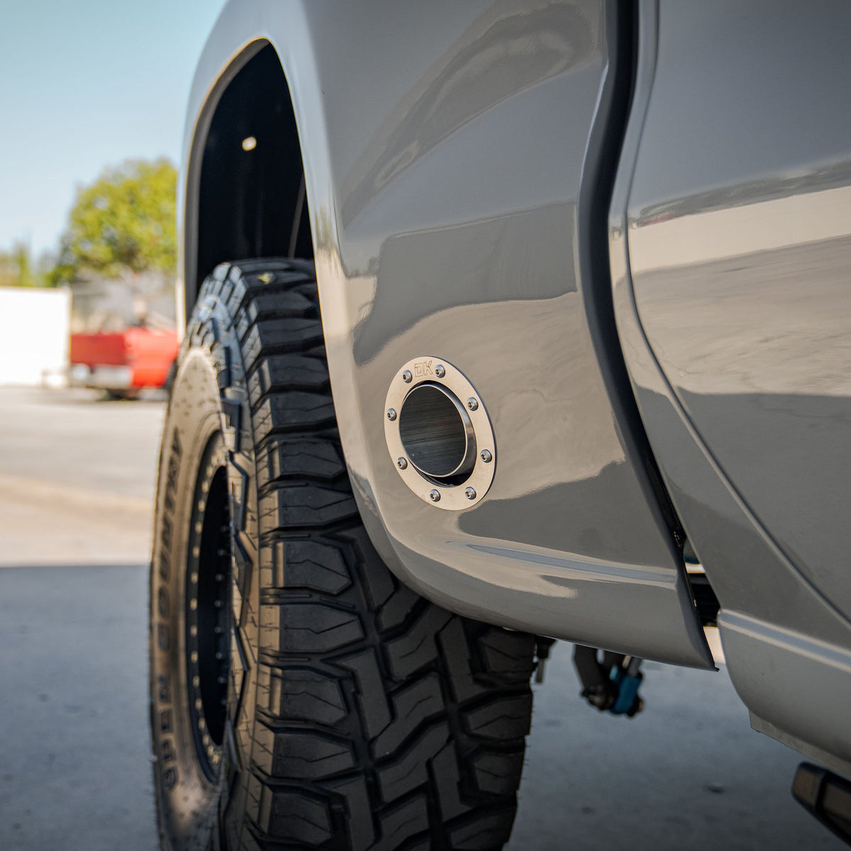 Dirt King Side Exit Exhaust Bezels installed — wide view